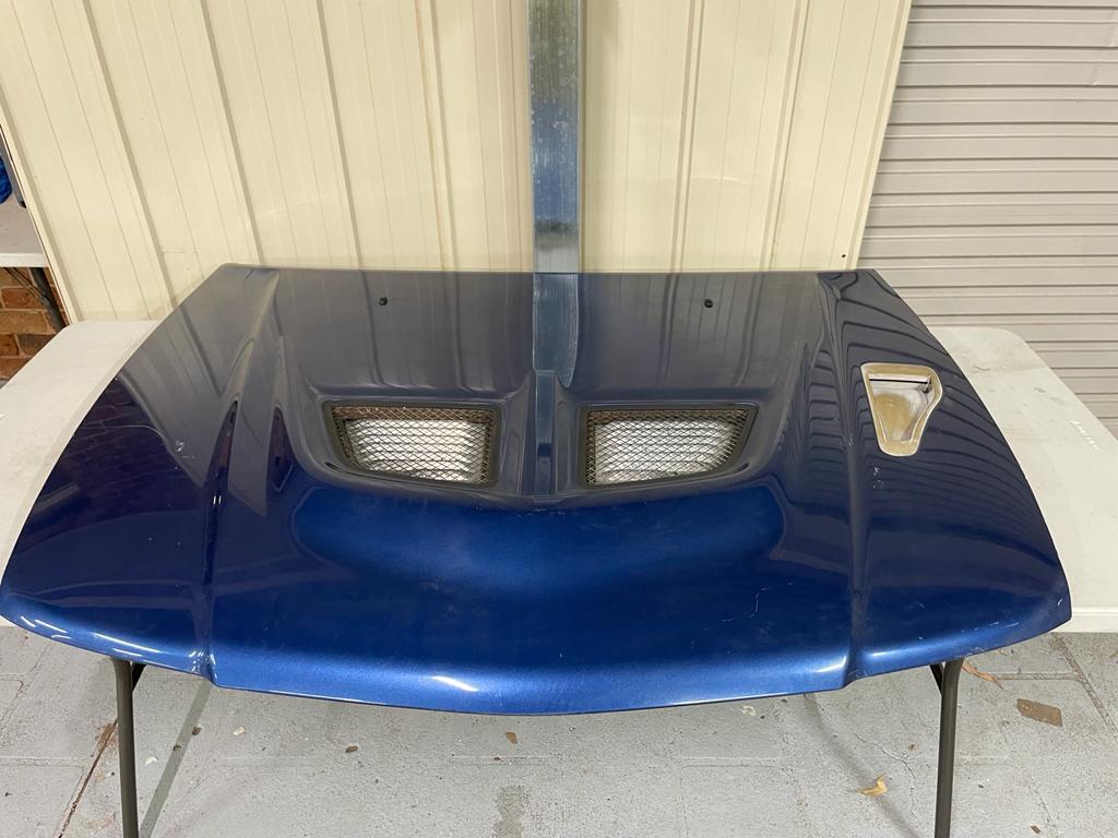 Mitsubishi Lancer Evolution 5/6/6.5 TME CP9A Genuine Bonnet - blue colour - used condition.