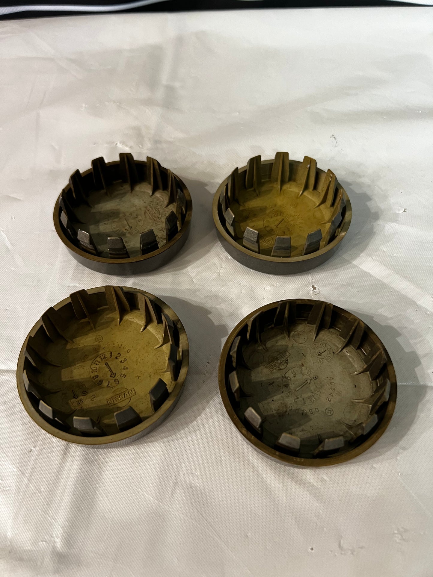 Nissan Skyline Bnr32 GTR OEM Wheel Center caps.