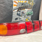 Mitsubishi Lancer Evolution 1-2-3 Tail Lights + rear reflector lights (discontinued item) sold as a set.