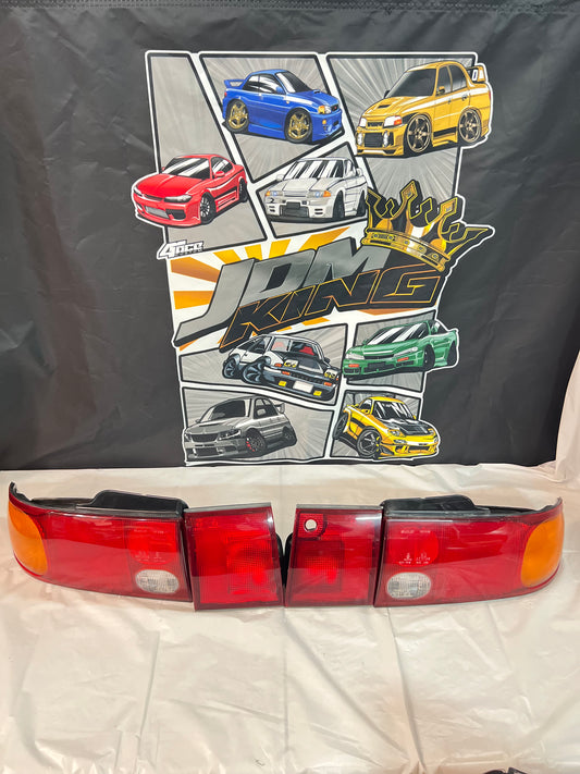 Mitsubishi Lancer Evolution 1-2-3 Tail Lights + rear reflector lights (discontinued item) sold as a set.