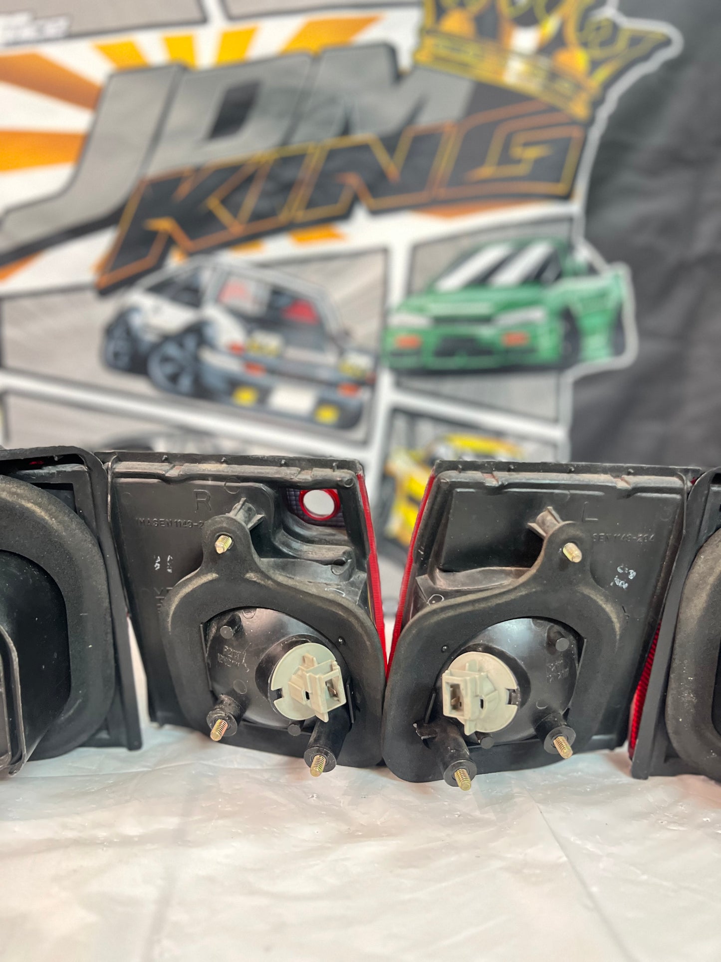 Mitsubishi Lancer Evolution 1-2-3 Tail Lights + rear reflector lights (discontinued item) sold as a set.