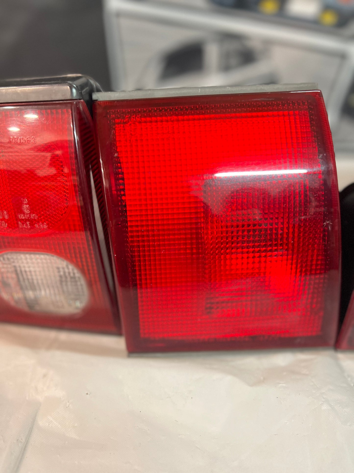 Mitsubishi Lancer Evolution 1-2-3 Tail Lights + rear reflector lights (discontinued item) sold as a set.