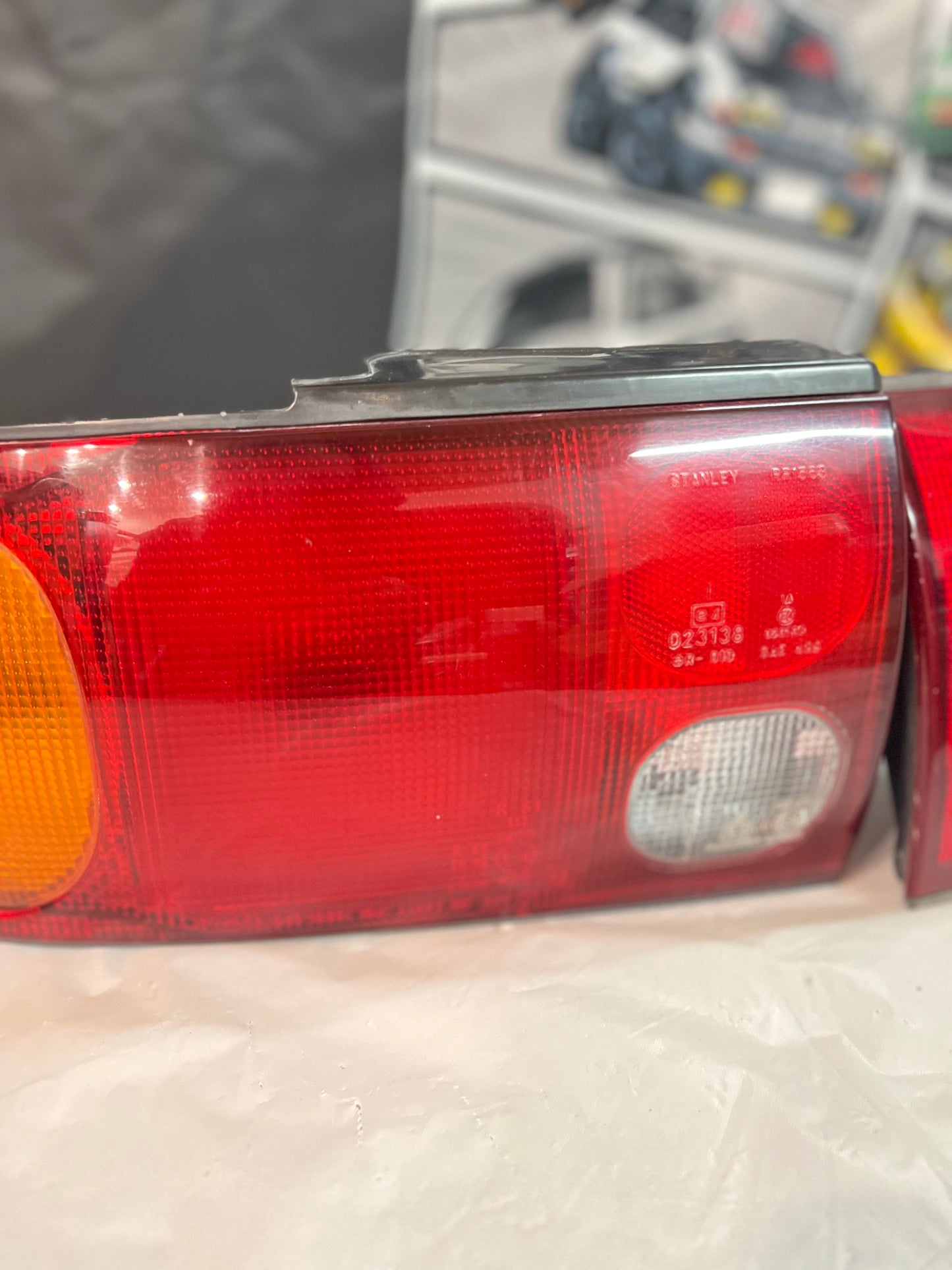 Mitsubishi Lancer Evolution 1-2-3 Tail Lights + rear reflector lights (discontinued item) sold as a set.