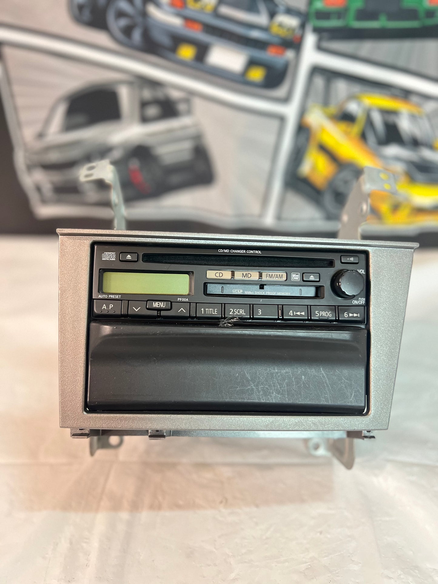 Nissan Skyline Bnr34 oem CD/MD PLAYER + pocket + brackets.