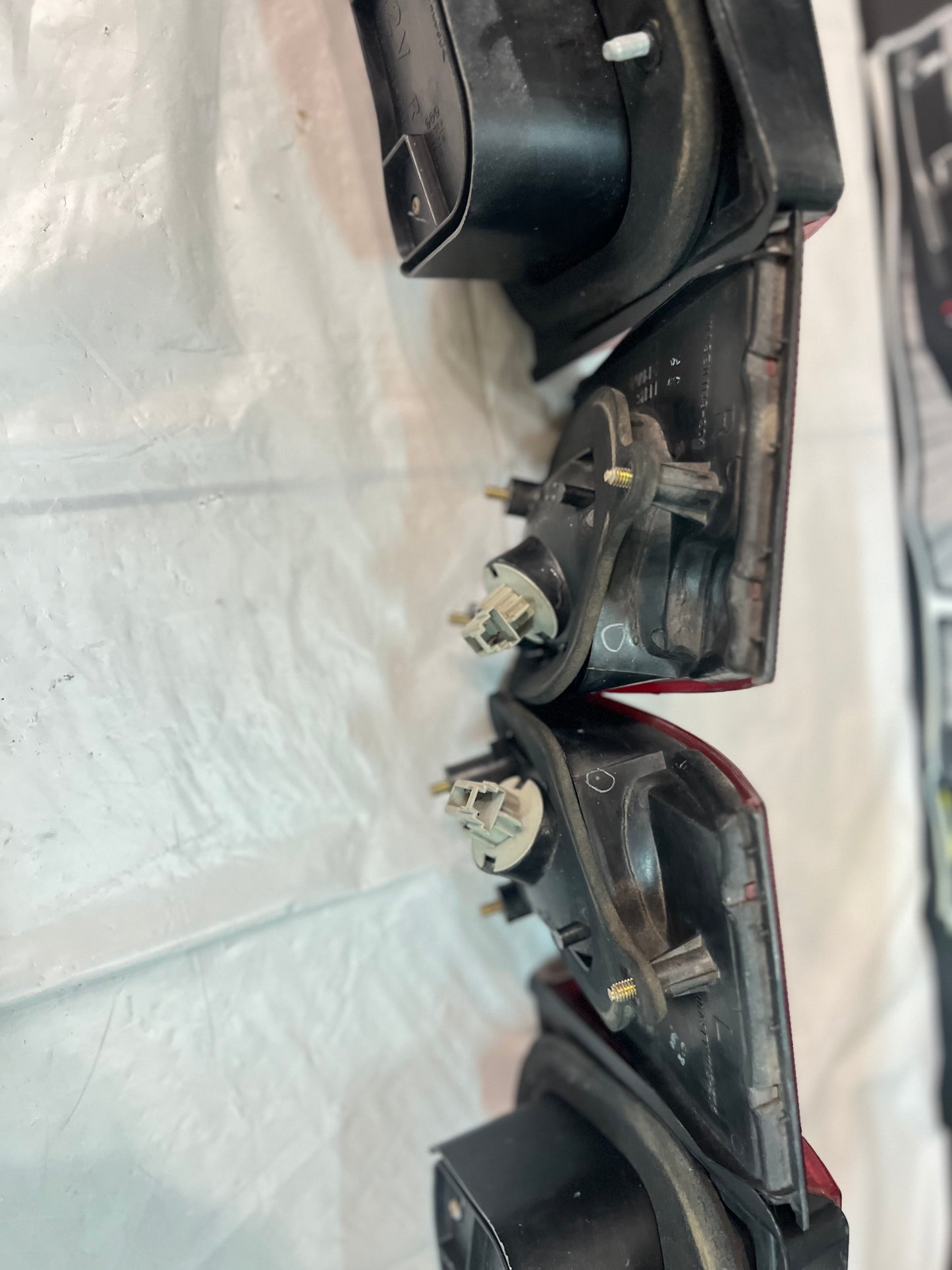 Mitsubishi Lancer Evolution 1-2-3 Tail Lights + rear reflector lights (discontinued item) sold as a set.