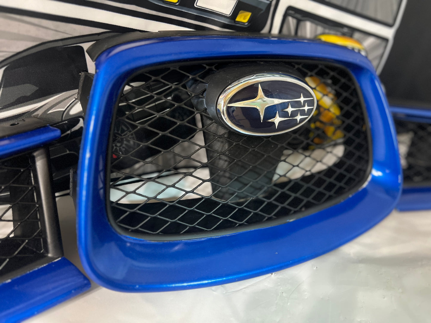 Subaru WRX STi 06-07 Hawkeye grill.           3 Piece set.