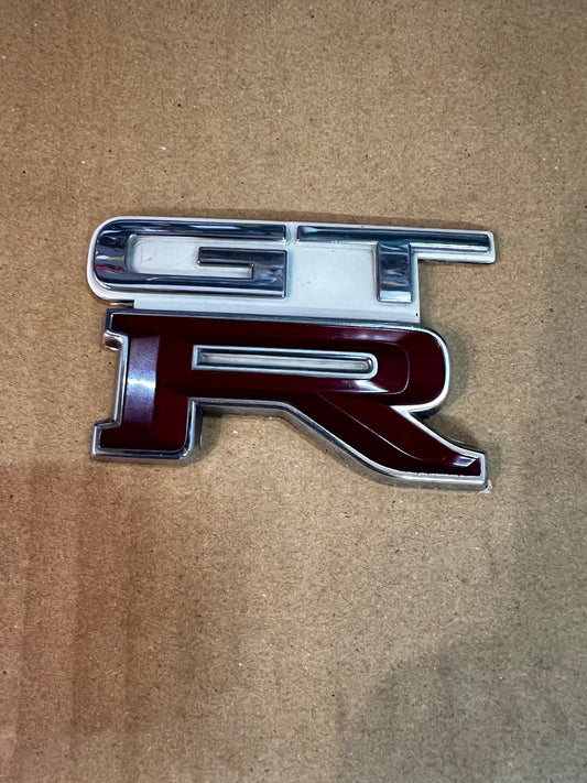 Nissan Skyline Bnr32 GTR OEM boot badge (white) discontinued item. used good condition. (A)
